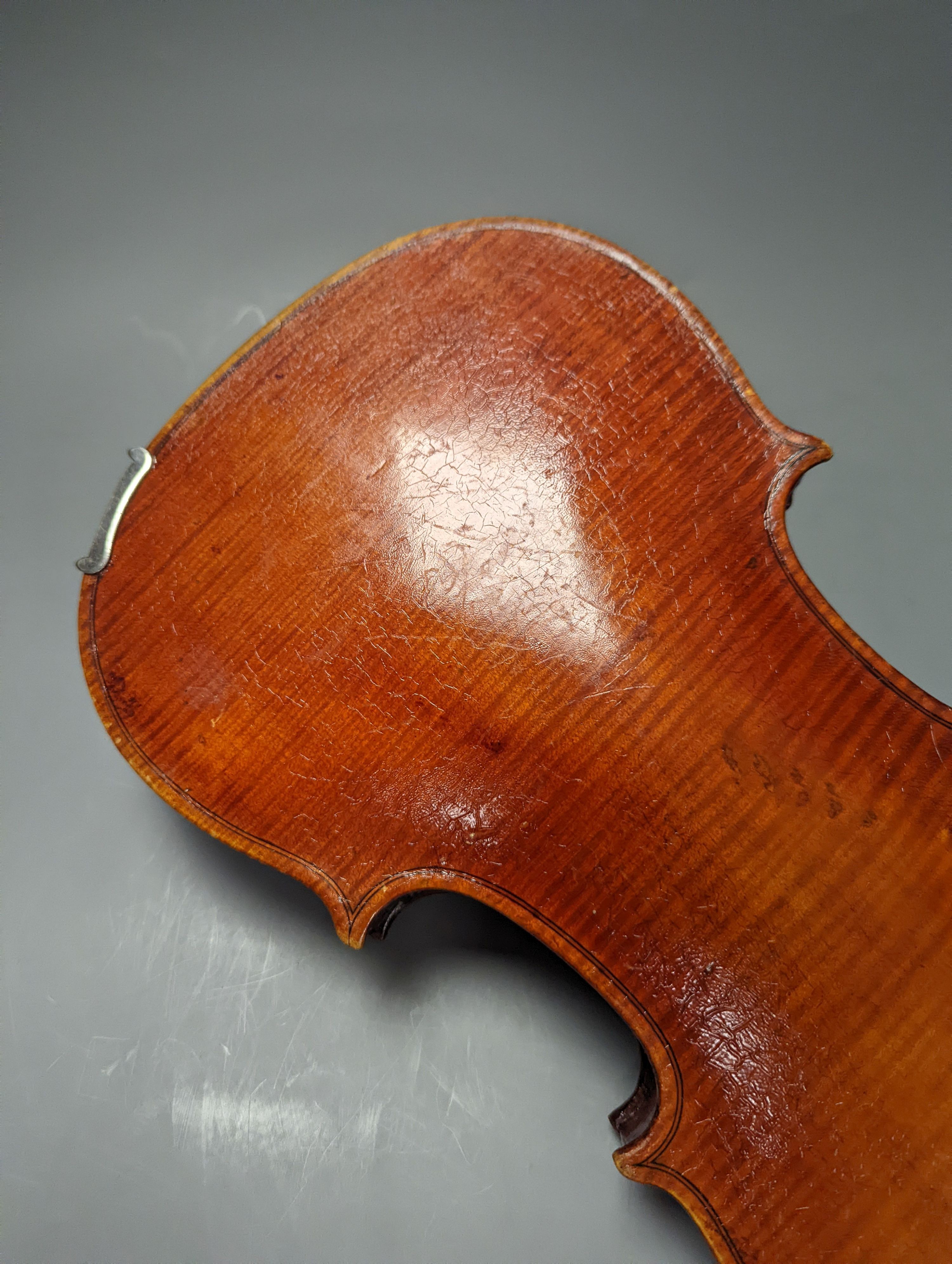 A violin in a mahogany case, case makers, Withers and sons, case 79 cms high.